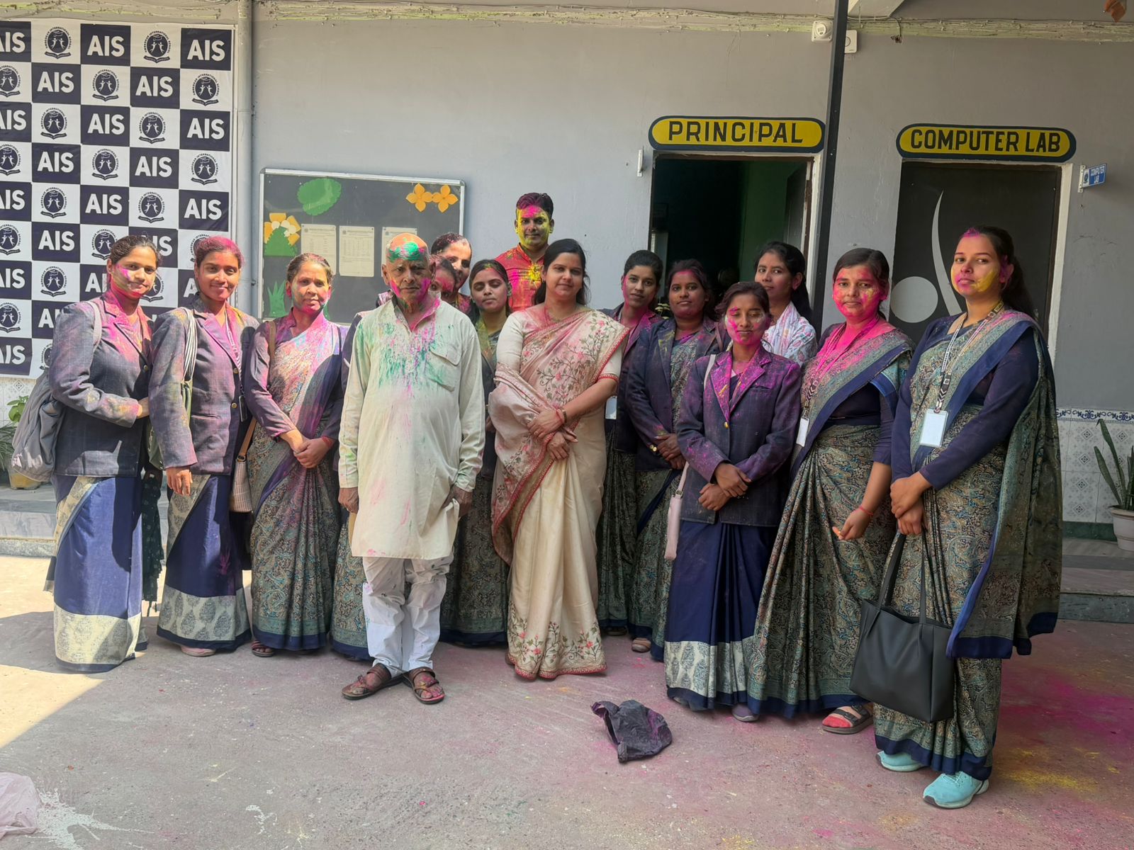 Holi — Staff